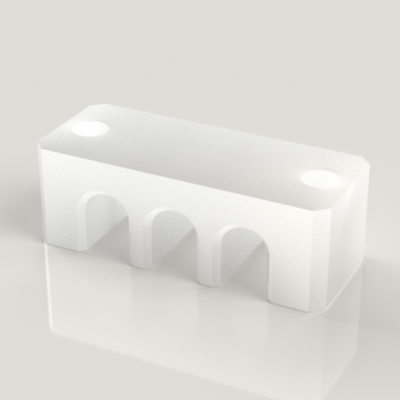 PTFE チューブ固定ブロックの樹脂加工の製作・見積もり事例